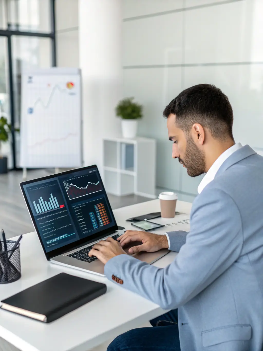An image of a financial analyst working on a complex algorithm on multiple monitors, showcasing the cutting-edge technology and innovative strategies used at Aura Investments.